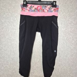 Lululemon Black and Pink Floral CroppedYoga Pants..SIZE:4